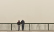  People stand on a bridge during a sandstorm in Cairo, Egypt, 5 April 2020. 