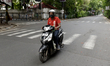 A Zomato food delivery man on a two wheeler during a government-imposed nationwide lockdow...