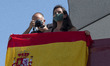 Spanish far-right party Vox Rocio Monasterio   wearing a face mask rides in an open top bu...