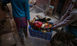 Women are taking archeological replicas in the store. Swayambhunath Temple, Swayambhu, Kat...