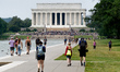 Protestors gather at the Lincoln Memorial for a protest against systemic inequality and po...