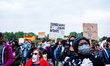 People are holding anti racist placards, during the second massive Black Lives Matter prot...