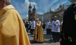 Archbishop Marek Jedraszewski leads Corpus Christi procession in Krakow's Old Town.The Fe...