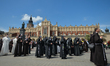 Members of different catholic religious orders seen during a Corpus Christi procession led...