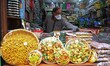 SHOPIAN, KASHMIR, INDIA-JUNE 13: A shop owner arranging dry fruits in Srinagar, Kashmir on...