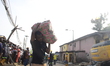 A man rescue some remains of his belongings after a building collapse at Gafari Balogun st...