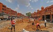 Labourers work under the Smart City Project on Chandpole Bazar road, at heritage walled ci...