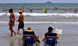  People celebrate Independence Day by reading a book at the beach on July 4, 2020 in Cocoa...