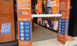 Barrier at a mobile phone shop to ensure social distancing (physical distancing) and preve...