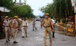 Security personnel stand guard outside a hotel where Congress leaders and MLA are staying...