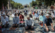 Faithful wait at the historic Sultanahmet district of Istanbul, outside the Hagia Sophia,...