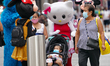 A view of people wearing masks in Times Square as New York  City enters Phase 4 of re-open...