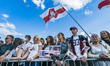 Supporters of Svetlana Tikhanovskaya, presidential candidate in Belarus elections 2020, ho...