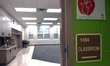 An empty classroom near the building exit which is designated as an isolation room for sic...