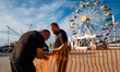 Workers work on the creation of the access gates to the Luna Park in Molfetta on 2 October...