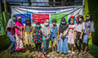 Students pose for photos in front of the Rumah Pintar in Kemijen Sub-district, Semarang, C...