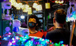 A boy wearing mask checks out decorative light at a shop in Kolkata.Citizens flock to mark...