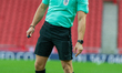  Referee Steve Martin keeping an eye on the ball following a free kick to MK Dons during t...
