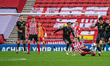 Max Power slides into a challenge with Scott Fraser during the Sky Bet League 1 match betw...