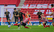  Grant Leadbitter slides into a challenge against Scott Fraser during the Sky Bet League 1...
