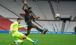  Cameron Jerome nearly intercepts Remi Matthews clearance during the Sky Bet League 1 matc...