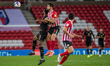  Bailey Wright beats Cameron Jerome to the ball during the Sky Bet League 1 match between...