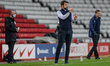  Russell Martin MK Dons Manager giving instructions to his team during the Sky Bet League...