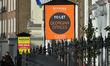 Estate agent signs advertising properties for sale and to let, in Dublin's city centre.On...