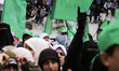 Palestinian supporters of the Hamas movement during a rally to mark the tenth anniversary...