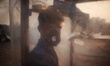 Abu Hanif (24),  reacts to the camera as he waits for customer inside his polythene wrappe...