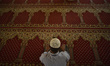 A Nepalese Muslim offer Friday ritual prayer after nine months in mosque at Nepal Jame Mas...
