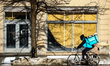 Wolt delivery courier is seen riding a bicycle in the center of Krakow, Poland. January 20...