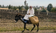 Man riding on a donkey deep in the Riff Mountains (Rif Mountains) in Morocco, Africa. 