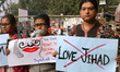 Indian Student and LGBT hold poster take part in a protest rally against Love Jihad in Kol...