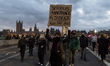 LONDON, UNITED KINGDOM - MARCH 15, 2021: Protesters demonstrate on Westminster Bridge agai...
