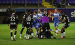 BARROW IN FURNESS, ENGLAND. MARCH 23RD:Referee Ben Speedie tries to diffuse tempers after...