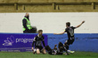 Grimsby Town's  Luke Spokes celebrates with Rollin Menayese and Harry Clifton after scorin...
