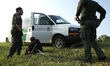 US Border Patrol agents detain illigal migrants on May 10, 2021 in Roma Texas, USA. Accord...