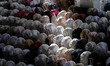 Acehnese Muslims are seen attending Eid al-Fitr prayer which marks the end of the holy mon...