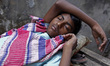 Labor of Kawran bazar area sleep in daytime in their workplace, in Dhaka, Bangladesh, on M...