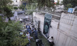 Staff members of a campaign center for the conservative politician, head of Iran's judicia...