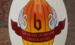 Emblem of the guild of chocolatiers of Bruges outside at a chocolatiers shop in Bruges (Br...