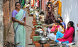 Hindu women finish the final preparations before cooking pongala along the roadside on the...