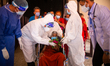 Health workers donned in Personal protective equipment (PPE) bid farewell to Kalika Devi B...