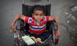 Mahmoud Naeem, 8 years old, physically disabled, is selling gum and candy in the streets t...