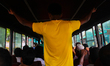 A man standing inside a bus as all the sits are filled up at Dhaka, Bangladesh, 14 July 20...