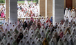 Indonesian Muslims are seen attending the Eid al-Adha prayer at the Islamic Center Mosque,...