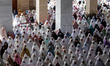 Indonesian Muslims are seen attending the Eid al-Adha prayer at the Islamic Center Mosque,...