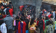 Devotees offer prayers and sacrifice animals to the Goddess Kali at Dakshinkali Temple in...