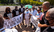 Protesters risking arrest for voting rights join Rev. Melvin Wilson in prayer at the concl...